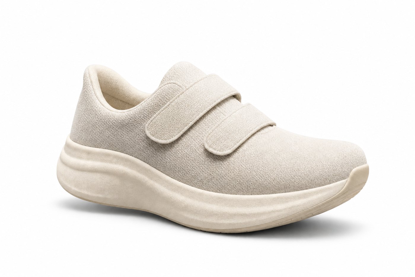 The Everyday wide fit trainer in Chalk White, showing the two adjustable straps and the rocker-profile midsole